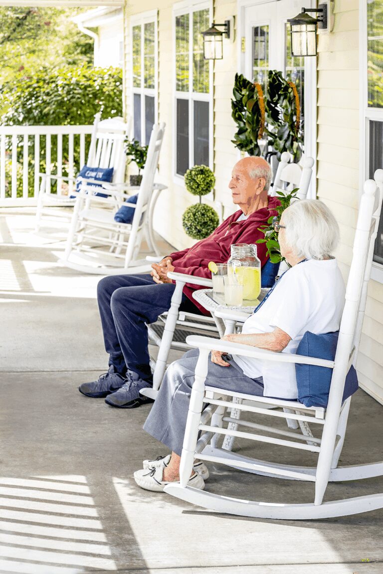 Seniors drinking lemonade on the porch