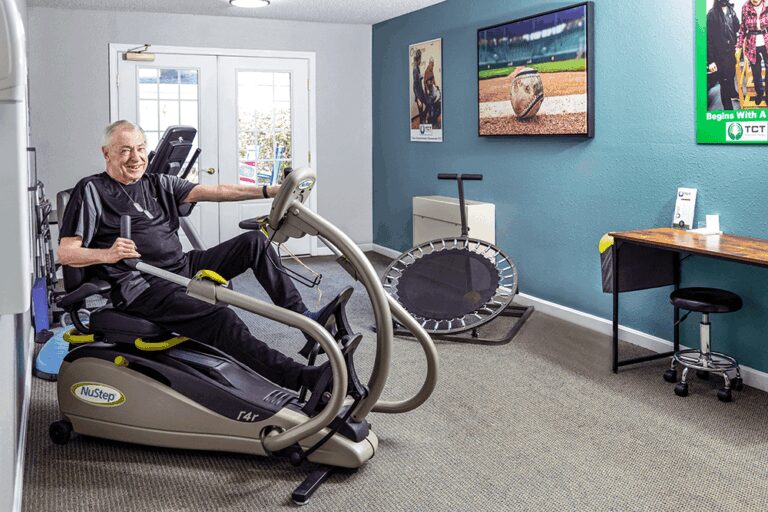 Man working out on a fitness machine