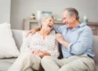 Senior couple laughing in apartment